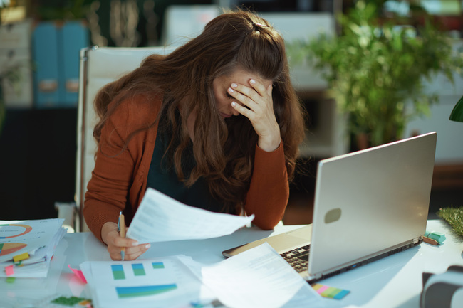 Psychological safety - icon of stressed person at desk